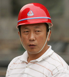 十八大农民工代表:农民工腰杆挺直了